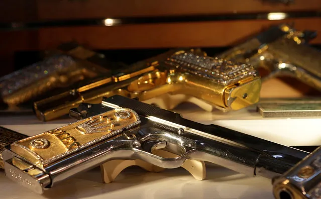 Guns decorated with gold and jewellery are displayed in the Drugs Museum, used by the military to showcase to soldiers the lifestyles of Mexican drug lords, at the headquarters of the Ministry of Defense in Mexico City, October 14, 2016. (Photo by Henry Romero/Reuters)