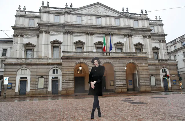 United States' soprano Lisette Oropesa poses in front of La Scala opera theater in Milan, Italy, Saturday, December 5, 2020. Soprano Lisette Oropesa was to be the first American to single a title role in the gala season opener of La Scala since Maria Callas in the 1950s. Then Italy’s virus cases surged, with an outbreak in both La Scala’s chorus and orchestra, forcing Italy’s premier opera house to cancel one of the top events on the European cultural calendar for the first time. Oropesa is one of 24 singers recording for a broadcast event marking the traditional Dec. 7 opening. (Photo by Antonio Calanni/AP Photo)