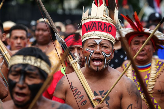People from various ethnic groups participate in a rally to commemorate Indigenous Resistance Day on October 12, 2025 in Caracas, Venezuela. (Photo by Jesus Vargas/Getty Images)