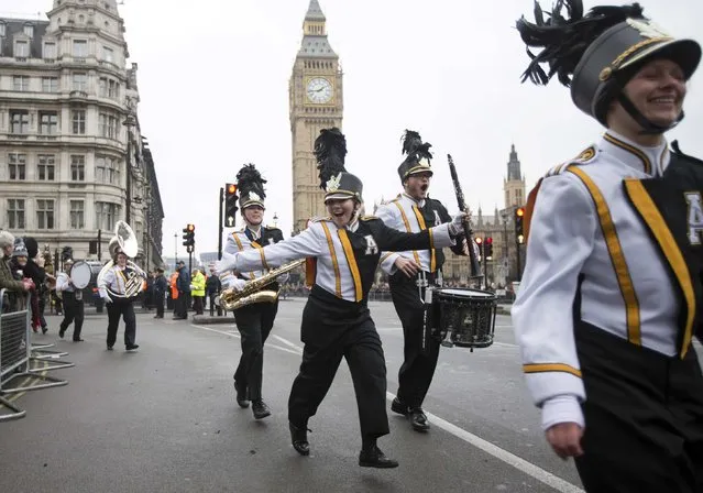 Members of the Appalachian State University Marching Mountaineers band from North Carolina in the U.S., celebrate after taking part in the annual New Year's Day parade in London January 1, 2015. (Photo by Peter Nicholls/Reuters)