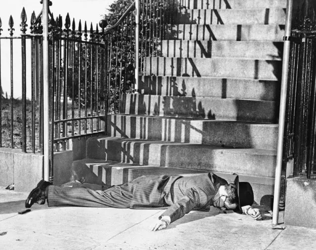 Gunfire was brought to the steps of President Truman's Washington home, Blair House, as two assassins tried to kill the chief executive, November 1, 1950. One of the gunmen, Oscar Collazzo of New York, lay wounded at the bottom of Blair House's front steps after the president's police guard had finished their work, at the cost of one guards' life, Dec. 9, 1950. The second gunman was killed. (Photo by Harvey Georges/AP Photo)