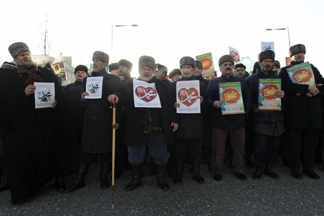 People attend a rally titled “Love for the Prophet Mohammad” to protest against satirical cartoons of the prophet, in Grozny, Chechnya January 19, 2015. (Photo by Eduard Korniyenko/Reuters)
