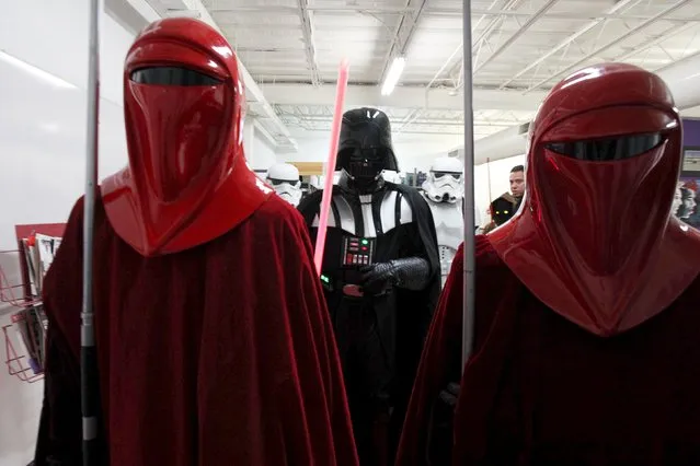 People dressed as Star Wars characters pose for a photograph during a Star Wars fan convention in Ciudad Juarez, December 5, 2015. (Photo by Jose Luis Gonzalez/Reuters)