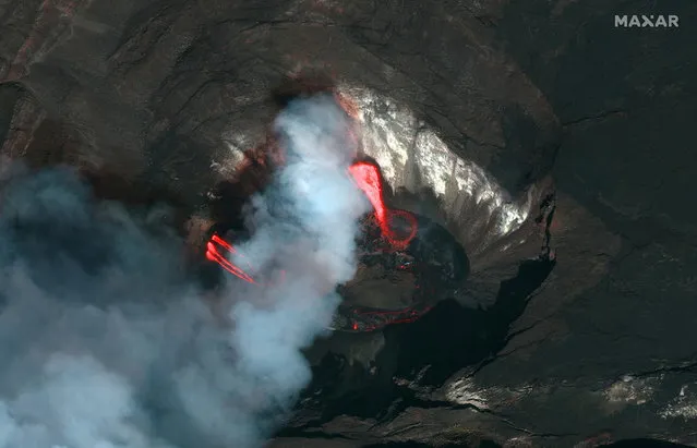 A Maxar's WorldView-2 satellite color infrared image shows a closeup view of the Kilauea volcano crater and lava erupting of  the Kilauea volcano in Hawaii, U.S., December 21, 2020. (Photo by Satellite image ©2020 Maxar Technologies/Handout via Reuters)