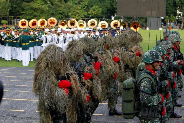 Soldiers parade for the change of command for the new Armed Forces chief at a military camp in Quezon City, Metro Manila, Philippines December 7, 2016. (Photo by Erik De Castro/Reuters)