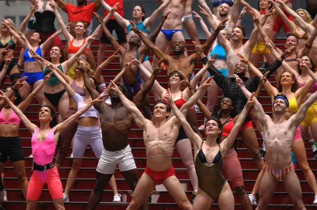 Members and cast of the charitable fundraising show “Broadway Bares” perform during a video shoot entitled “Twerk from Home” in Times Square on May 24, 2021. Broadway Bares was created in 1992 by Tony Award-winning director and choreographer Jerry Mitchell as a way to raise awareness and money for those living with HIV/AIDS. (Photo by Ed Jones/AFP Photo)