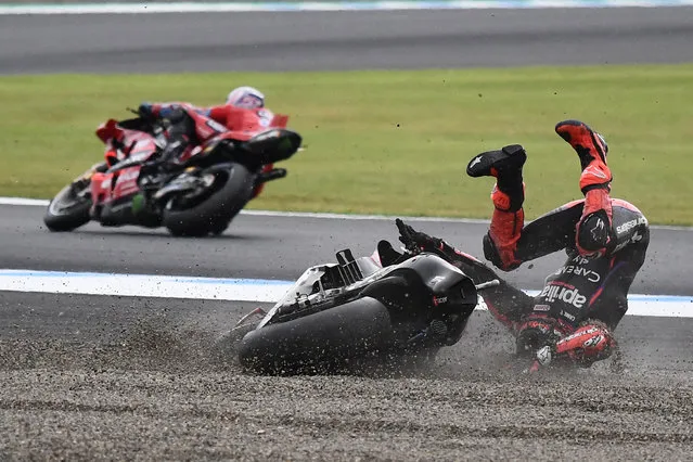 Aprilia Racing rider Maverick Vinales of Spain slips out the track right after the start of the MotoGP Japanese Grand Prix at the Mobility Resort Motegi in Motegi, Tochigi prefecture on October 1, 2023. (Photo by Toshifumi Kitamura/AFP Photo)
