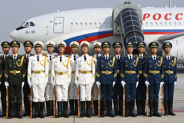 Chinese honor guards are seen after welcoming Russia's President Vladimir Putin at Beijing Capital International Airport ahead of the Third Belt and Road Forum on October 17, 2023 in Beijing, China. (Photo by Parker Song - Pool/Getty Images)