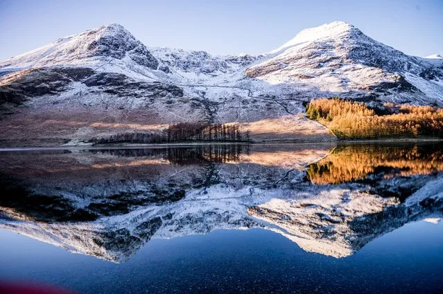 Freezing temperatures and clear nights created pristine conditions for a reflection of snow-covered fells in Buttermere in the Lake District, UK in the second decade of January 2024. (Photo by Charlotte Graham/The Times)