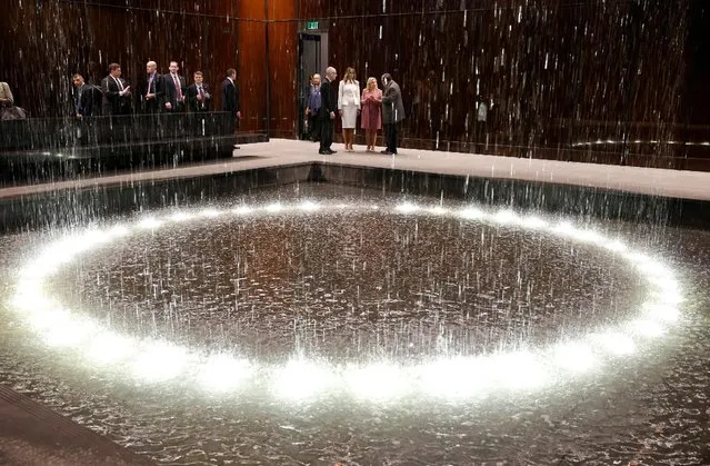 U.S. first lady Melania Trump and Sara Netanyahu look at the Contemplative Court fountain during a visit to the African American Museum of History and Culture in Washington, U.S., February 15, 2017. (Photo by Joshua Roberts/Reuters)