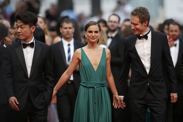 Actress and director Natalie Portman (C) director Hong Won-Chan (L) and director Laszlo Nemes pose on the red carpet as they arrive for the screening of the film “Sicario” in competition at the 68th Cannes Film Festival in Cannes, southern France, May 19, 2015. (Photo by Benoit Tessier/Reuters)