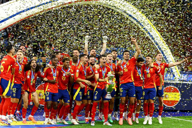 Spain players lifts the 2024 UEFA European Football Championship trophy Spain v England, at UEFA European Championship 2024, Final, Football, Olympiastadion in Berlin, Germany on July 14, 2024. (Photo by Kieran McManus/Rex Features/Shutterstock)