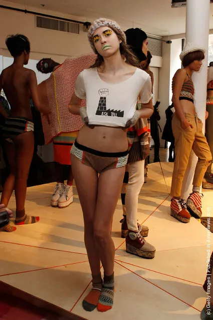 A model  poses at the Degen Fall 2012 presentation during Mercedes-Benz Fashion Week