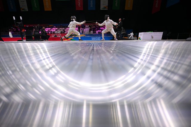 Daniyah Alhayrani of Team Al Noor (L) competes against Ayten Ayman Mohammed of Team Al Noor during the Youth Women's Epee Table of 16 Bout on day two of the Saudi Games 2024 on October 04, 2024 in Riyadh, Saudi Arabia. The Saudi Games is a multi-game combined sports tournament and the largest national sporting event held annually in the Kingdom. (Photo by Stuart Franklin/Getty Images for Saudi Games)