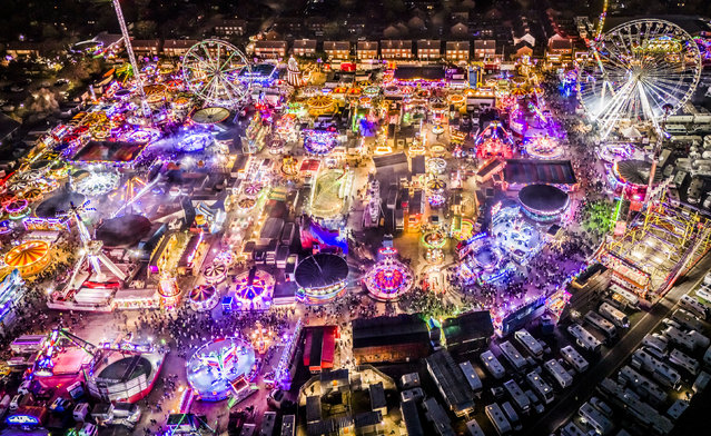 A general view of the Hull Fair 2024 in Yorkshire, UK on Friday, October 4, 2024, one of the largest travelling fairs in Europe, which features over 250 rides. The fair features an array of rides alongside traditional attractions such as palm reading and stalls packed with food, treats and games. (Photo by Danny Lawson/PA Wire)