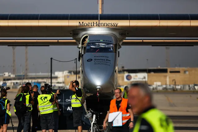 An experimental solar-powered airplane is seen after landing in Cairo, Egypt, Wednesday, July 13, 2016. The experimental aircraft, Solar Impulse 2, flew out of the Seville airport in Spain on Monday and landed in Cairo on Wednesday. (Photo by Mohamed Elraai/AP Photo)