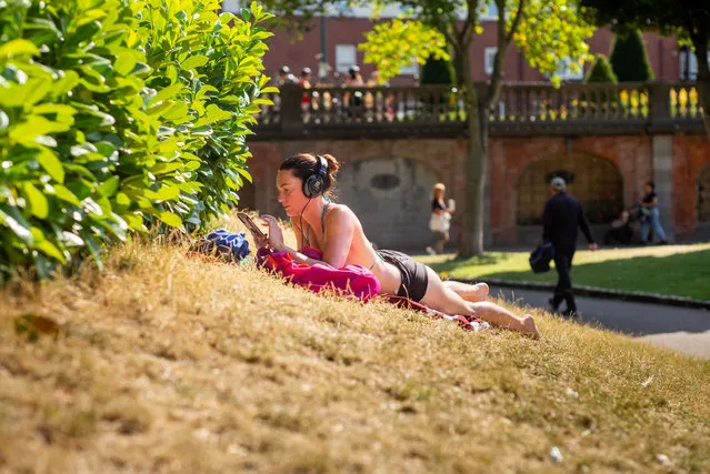 Lisa Morrissey, from Golden Lane, enjoying the sun at St Patrick’s Park, Dublin on August 9, 2022. (Photo by John Ohle for Irish Times)