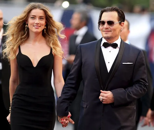 Actor Johnny Depp and his wife Amber Heard arrive for the red carpet event for the movie “Black Mass” at the 72nd Venice Film Festival in northern Italy September 4, 2015”. (Photo by Stefano Rellandini/Reuters)