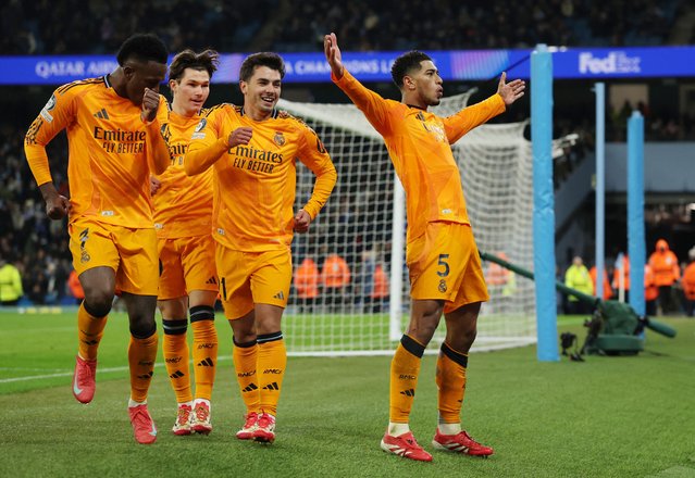 Jude Bellingham of Real Madrid celebrates scoring his side's third goal during the UEFA Champions League 2024/25 League Knockout Play-off first leg match between Manchester City and Real Madrid C.F. at Manchester City Stadium on February 11, 2025 in Manchester, England. (Photo by Phil Noble/Reuters)
