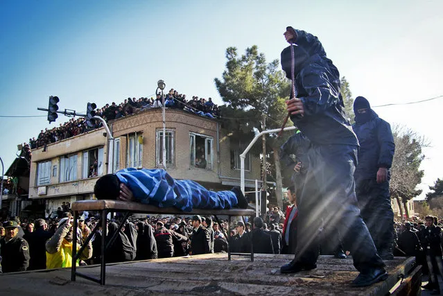 An Iranian officer lashes a man, convicted of rape, at the northeastern city of Sabzevar, Iran, Wednesday, Jan. 16, 2013. Rape, like murder and treason, can be punished by the death sentence in Iran, but sometimes judges imposed a sentence of lashes before execution or imprisonment. (Photo by Hossein Esmaeli/AP Photo)