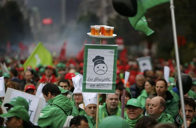 Demonstrators protesting government reforms and cost-cutting measures march in central Brussels, October 7, 2015.  The sign reads "Flexi-jobs, no thanks!". (Photo by Francois Lenoir/Reuters)