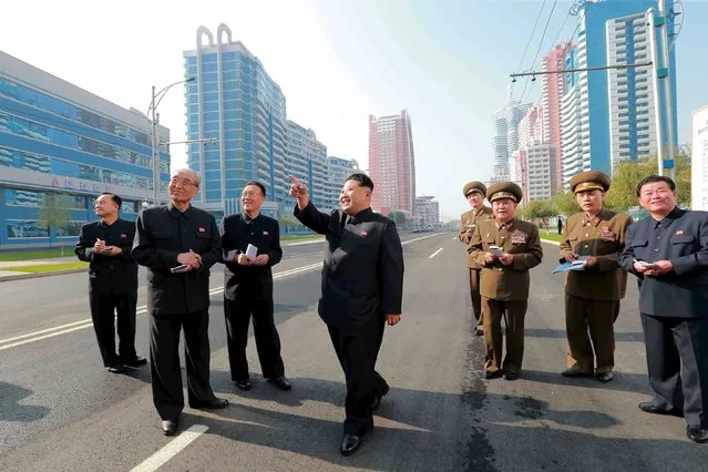 North Korean leader Kim Jong Un inspects the completed Mirae Scientists Street, in this undated photo released by North Korea's Korean Central News Agency (KCNA) in Pyongyang on October 21, 2015. (Photo by Reuters/KCNA)