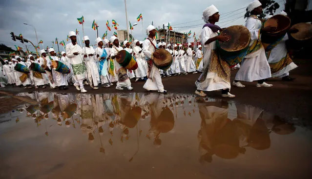 A church choir performs in a procession during the Meskel Festival to commemorate the discovery of the true cross on which Jesus Christ was crucified on, at the Meskel Square in Ethiopia's capital Addis Ababa, September 26, 2016. (Photo by Tiksa Negeri/Reuters)