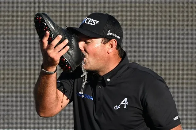 Patrick Reed of 4Aces GC does a shoey during day three of Liv Golf Adelaide at The Grange Golf Course on April 23, 2023 in Adelaide, Australia. (Photo by Asanka Ratnayake/Getty Images)