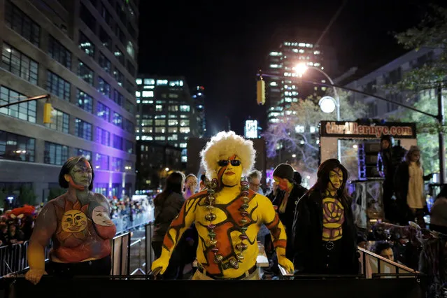 Cannonball Johnson stands dressed in body paint as he participates in the Greenwich Village Halloween Parade in Manhattan, New York, U.S., October 31, 2016. (Photo by Andrew Kelly/Reuters)