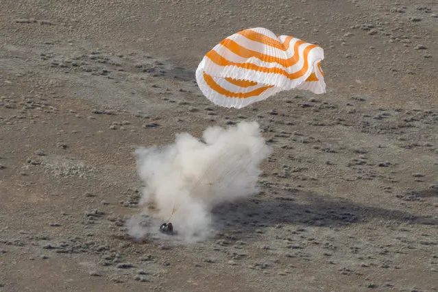 In this photo released by the Roscosmos Space Agency, the Russian Soyuz MS-19 space capsule lands southeast of the Kazakh town of Zhezkazgan, Kazakhstan, Wednesday, March 30, 2022. The Soyuz MS-19 capsule landed upright in the steppes of Kazakhstan on Wednesday with NASA astronaut Mark Vande Hei, Russian Roscosmos cosmonauts Anton Shkaplerov and Pyotr Dubrov. (Photo by Irina Spektor/Roscosmos Space Agency via AP Photo)