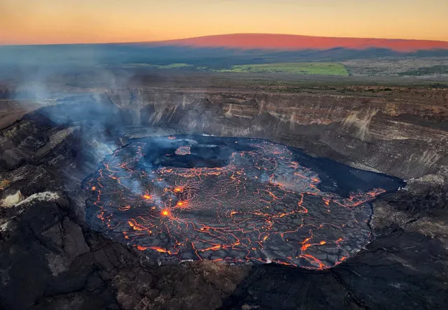 The summit crater of the Kilauea volcano, Hawaii in March 2023. (Photo by AP Photo/Stringer)