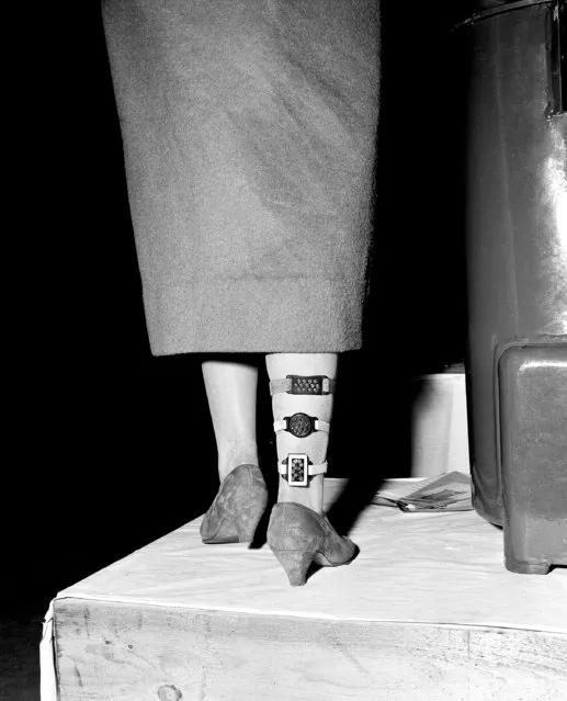 Leg art for safety's sake. “Cats eyes” for pedestrians to make them visible in the headlights of automobiles and motorcycles were shown by an inventor at the German Inventors' Fair in Recklinghausen, Germany, December 21, 1956. Although “cats' eyes” for pedestrians are not brand new, may be this arrangement opens ways for more decorative designs. (Photo by Horst Faas/AP Photo)
