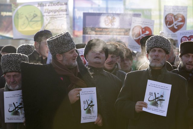 People attend a rally to protest against satirical cartoons of prophet Mohammad, in Grozny, Chechnya January 19, 2015. (Photo by Eduard Korniyenko/Reuters)