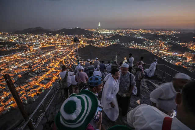 Muslim Hajj pilgrims visit Hiraa cave at Jabal al-Nour “The Mountain of Light” during Hajj pilgrimage in Mecca, Saudi Arabia, 15 August 2018. Around 2.5 million Muslims are expected to attend this year's Hajj pilgrimage, which is highlighted by the Day of Arafah, one day prior to Eid al-Adha. Eid al-Adha is the holiest of the two Muslims holidays celebrated each year, it marks the yearly Muslim pilgrimage (Hajj) to visit Mecca, the holiest place in Islam. (Photo by Mohammed Saber/EPA/EFE)