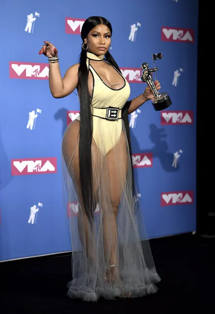 Nicki Minaj poses in the press room with her award for best hip-hop video for “Chun-Li” at the MTV Video Music Awards at Radio City Music Hall on Monday, August 20, 2018, in New York. (Photo by Evan Agostini/Invision/AP Photo)