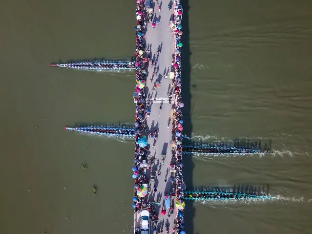 A traditional boat race was held at the Titas River in Brahmanbaria on September 7, 2023. Thousands of people of coastal area of the river enjoyed the race. The district administration in Brahmanbaria organized the program. A total of 14 boats from Brahmanbaria, Habiganj and Kishoreganj took part at the race. (Photo by Muhammad Amdad Hossain/NurPhoto/Rex Features/Shutterstock)