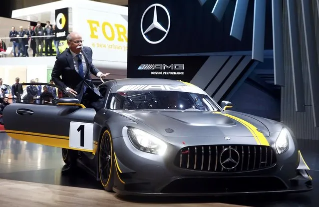 Daimler CEO Dieter Zetsche presents the new Mercedes-AMG GT3 race car during the first press day ahead of the 85th International Motor Show in Geneva March 3, 2015. REUTERS/Arnd Wiegmann