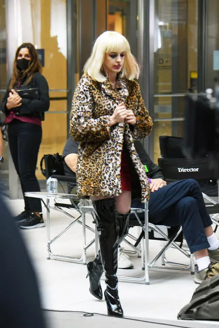 Anne Hathaway is spotted filming WeCrashed in New York City on June 11, 2021. The 38 year old actress looked unrecognizable in a bright blonde wig and a myriad of faux wounds on her face as she filmed an intense scene on the street. (Photo by The Image Direct)