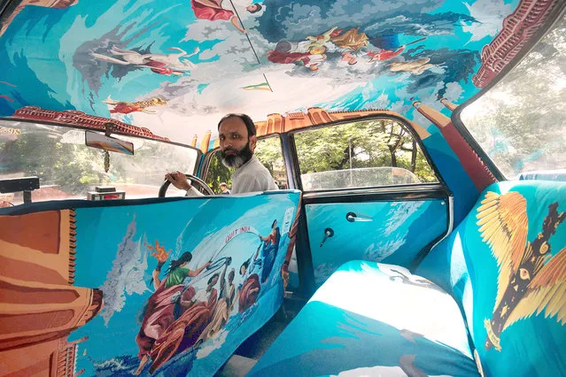 So far Taxi Fabric has produced 26 new interiors, ranging from vibrant patterns to mock-classical art. Others feature Indian freedom fighters, childhood memories on Juhu Chowpatty beach and sign language motifs designed with deaf children in mind. The Taxi Fabric brief is simple: tell the story of Mumbai. (Photo by Niqita Gupta/Taxi Fabric/The Guardian)