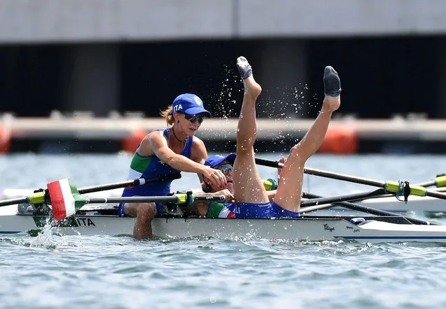 Federica Cesarini and Valentina Rodini of Team Italy react after winning the gold medal during the Lightweight Women's Double Sculls Final A on day six of the Tokyo 2020 Olympic Games at Sea Forest Waterway on July 29, 2021 in Tokyo, Japan. (Photo by Piroschka van de Wouw/Reuters)