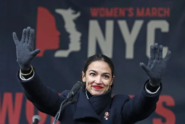 U.S. Rep. Alexandria Ocasio-Cortez, (D-New York) waves to the crowd after speaking at Women's Unity Rally organized by Women's March NYC at Foley Square in Lower Manhattan, Saturday, January 19, 2019, in New York. (Photo by Kathy Willens/AP Photo)