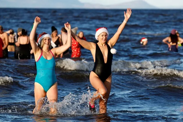 Members of the public take part in Ayrshire Cancer Support Boxing Day Dip on December 26, 2023 in Various Cities. (Photo by Jeff J. Mitchell/Getty Images)