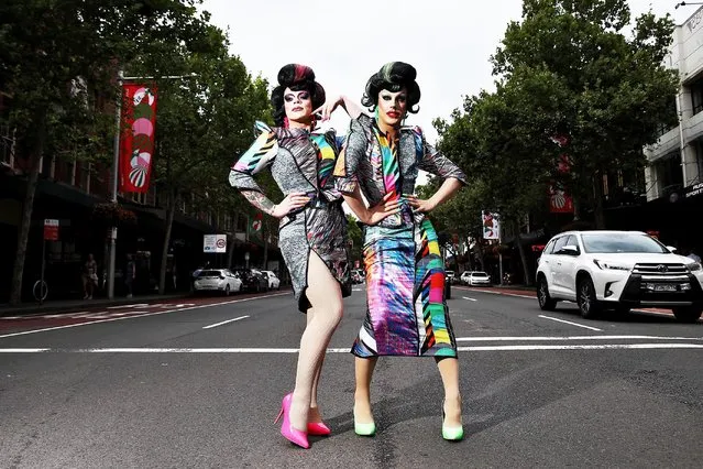 Drag Queens Art Simone and Etcetera Etcetera pose on Oxford Street on November 19, 2021 in Sydney, Australia. Art Simone and Etcetera Etcetera have announced their new regional national tour “As Seen On TV” which will see the drag queens perform around Australia in 2022. (Photo by Don Arnold/WireImage)