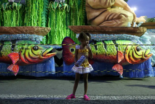 A girl is pictured before the first night of the Carnival parade of samba schools at Sambadrome in Rio de Janeiro, Brazil, February 26, 2017. (Photo by Pilar Olivares/Reuters)