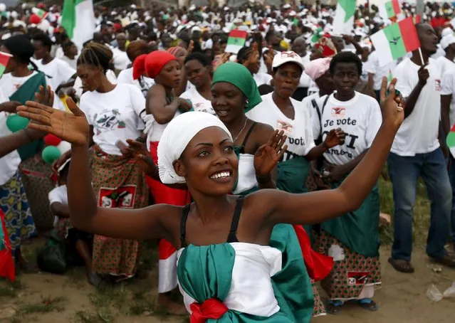 A supporter of Burundi's President Pierre Nkurunziza dance during a rally in Bujumbura, Burundi, May 17, 2015. (Photo by Goran Tomasevic/Reuters)