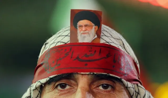 A man has a picture of Iranian supreme leader Ali Khamenei on his forehead during an anti-Israeli demonstration at Palestine Square in Tehran, Iran, 01 April 2024. According to IRNA News Agency, Israel on 01 April launched an airstrike targeting the Iranian consulate building in Damascus. The embassy was damaged while the building annexed to it was destroyed. Seven Iranians have been killed including two top commander of Iranian revolutionary guard corps (IRGC). (Photo by Abedin Taherkenareh/EPA/EFE)