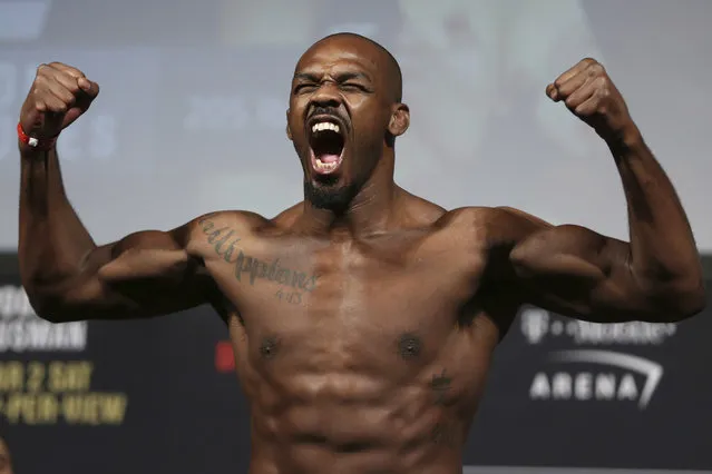 In this March 1, 2019, file photo, Jon Jones poses during the ceremonial UFC 235 mixed martial arts weigh-in event in Las Vegas.  Jones defends his light heavyweight title against Thiago Santos, of Brazil, in the main event of UFC 239 at T-Mobile Arena in Las Vegas on Saturday night, July 6, 2019. (Photo by Erik Verduzco/Las Vegas Review-Journal via AP Photo)