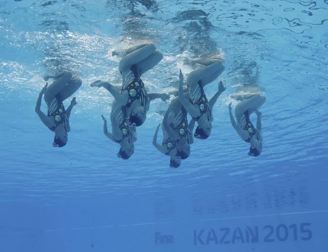 Team Japan perform underwater their synchronised swimming team technical routine preliminary at the Aquatics World Championships in Kazan, Russia, July 25, 2015. (Photo by Michael Dalder/Reuters)