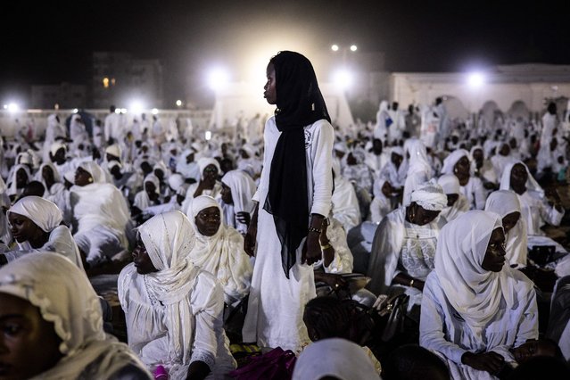 Muslim worshippers gather during Gamou celebrations at the Seydina Limamou Laye Mausoleum in the popular Yoff neighborhood in Dakar on September 15, 2024. Gamou is the celebration of the birthday of the Prophet Muhammad. (Photo by John Wessels/AFP Photo)