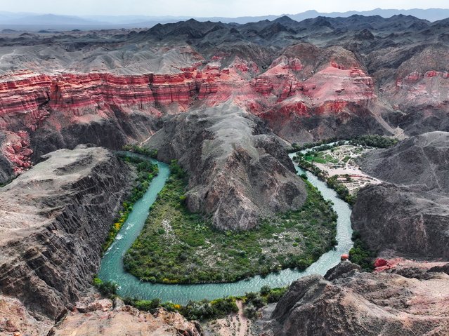 An aerial view of Charyn Canyon located about 200 kilometers east of Almaty city in Kazakhstan on September 22, 2024. The canyon, visited by more than 50,000 people each year, was placed under protection in 1964 and became part of the Charyn National Park, established on February 23, 2004. (Photo by Muhammed Enes Yildirim/Anadolu via Getty Images)